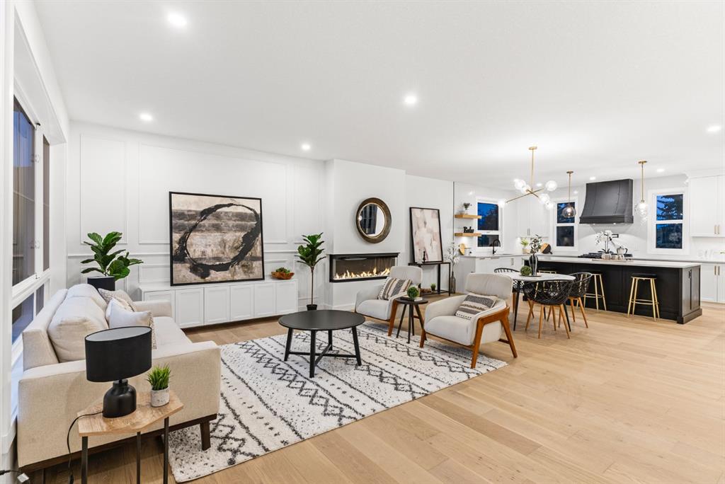 Open-plan living room and kitchen in a completed Calgary infill home